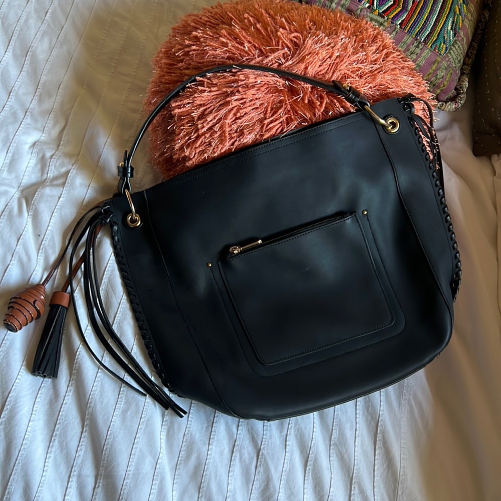Anthropologie BLACK polyurethane purse w tassels and fringe.